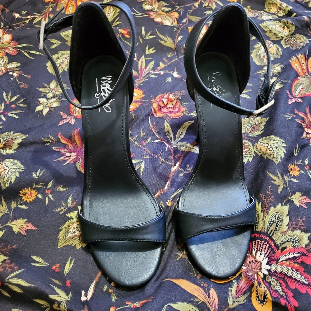 Gorgeous black stilettos. High heel.